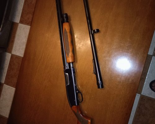 Escopeta de corredera Winchester