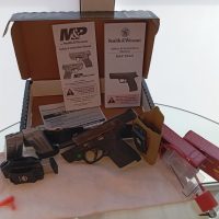 Arma corta Smith & wesson MP shield 2.0 láser verde.