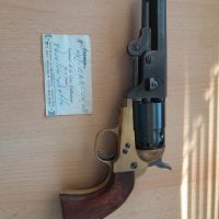 8REVOLVER DE AVANCARGA